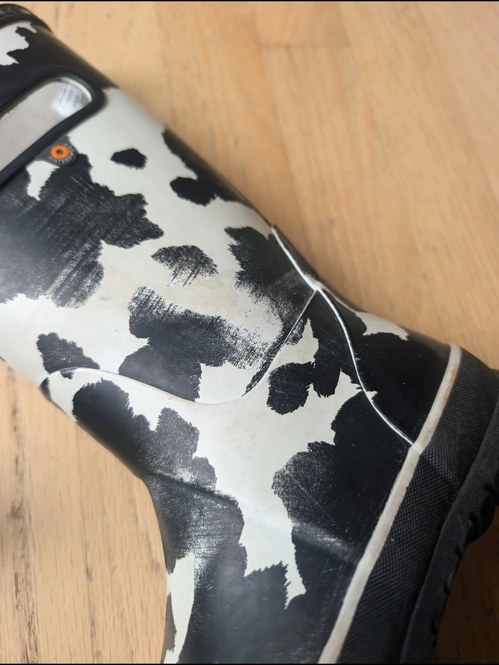 Bogs Kids Cow-Print Rain & Snow Boots in Black and White